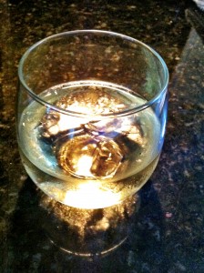 A cold glass of chardonnay.  Stemless, so you can also garden (pull random weeds) while you are grilling.