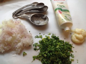 Garlic paste, minced onion, and chopped parsley.