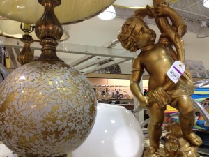 Gilded globe and cherub lamps.